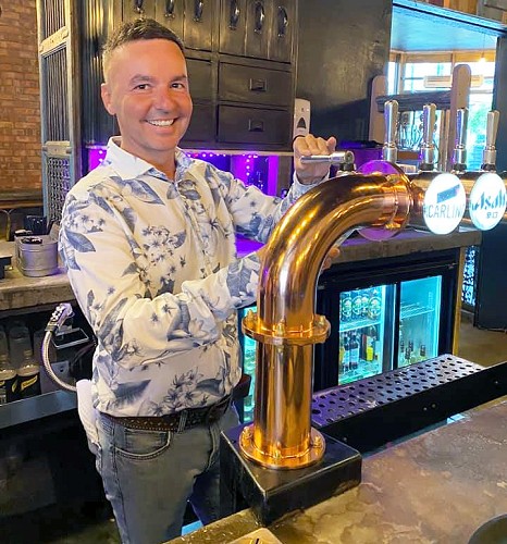 Lawrence Barton behind the bar at Loft Lounge Bar and Kitchen in Birmingham Lawrence Barton behind the bar at Loft Lounge Bar and Kitchen in Birmingham